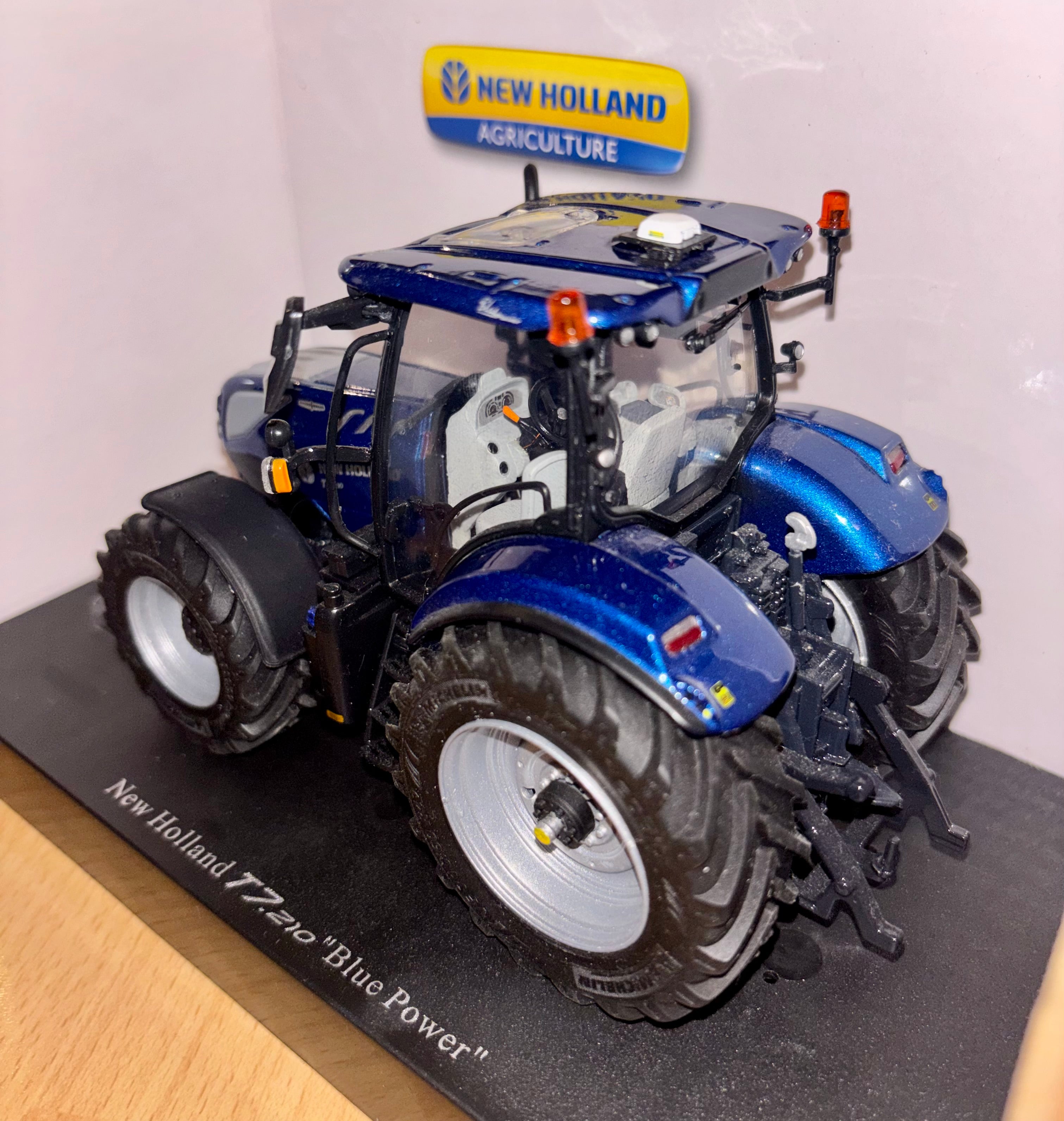 Universal Hobbies New Holland T7.210 Blue Power With P32 Wheels- 1:32 Scale